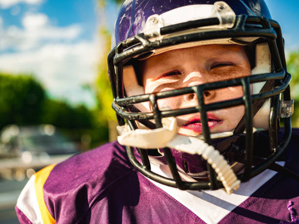 istock Junior Football player during game 1254623762