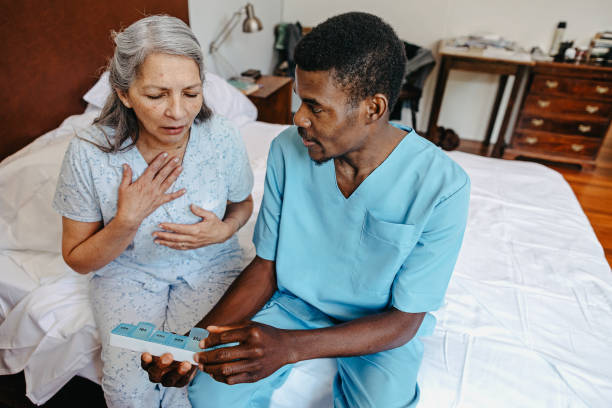istock Doctor helping with meds 1254624019