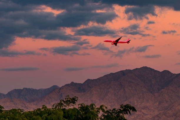 Colorful sunrise with clouds above mountains, Middle East