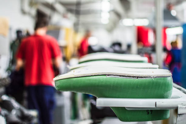 istock Shoe making factory 1254625359