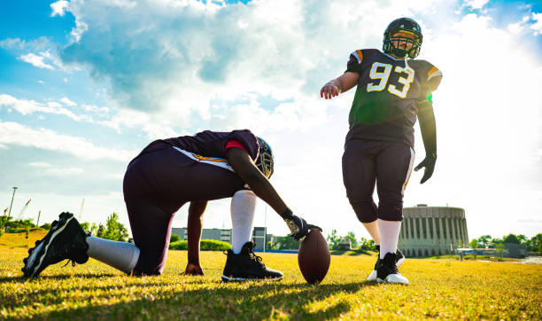 istock Junior Football players during game 1254625938