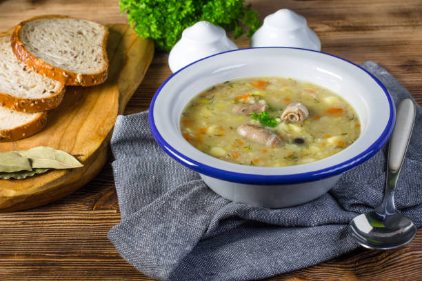 istock Polish barley soup with vegetables and chicken heart. 1254627971