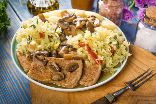 istock Braised pork loin with mushrooms. 1254628076