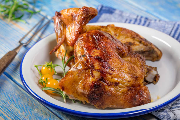 istock Chicken quarters baked. 1254629153