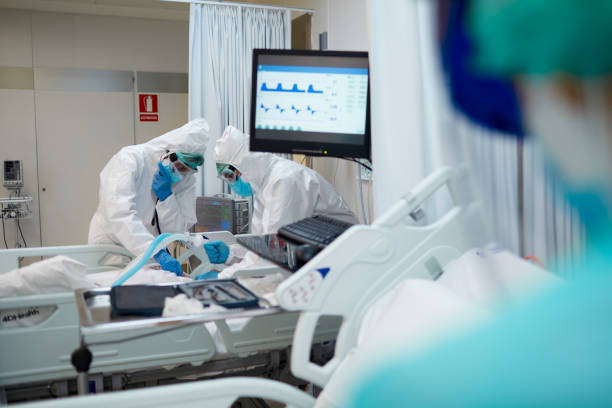 Healthcare workers during an intubation procedure to a COVID patient Hospital COVID
Healthcare workers during an intubation procedure to a COVID patient state of emergency stock pictures, royalty-free photos & images