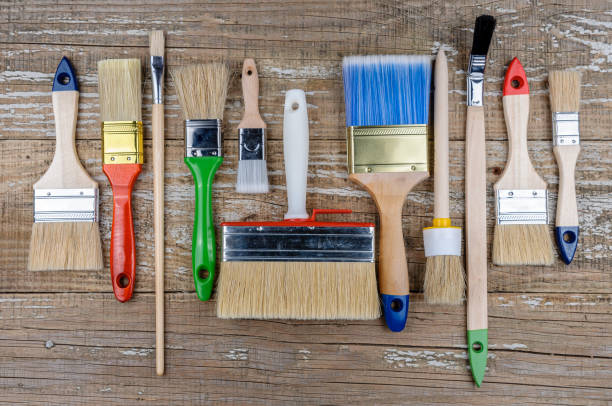 istock House painter brush on a wooden background. 1254631494