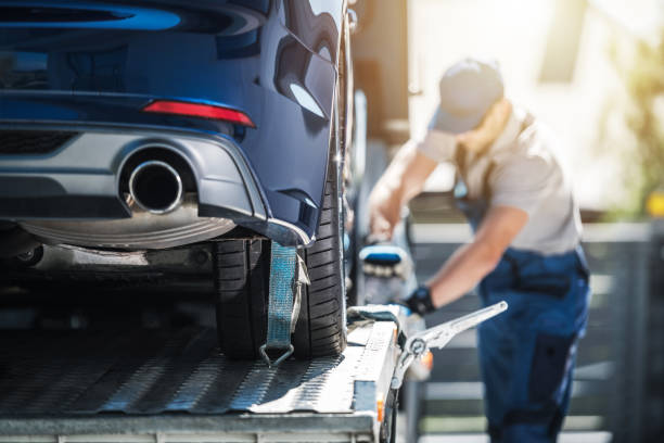 Shipping Brand New Car to Dealership Towing Truck Delivery. Shipping Modern Vehicle to Car Dealership From Auction Lot. Transportation and Cargo Theme. car recovery stock pictures, royalty-free photos & images