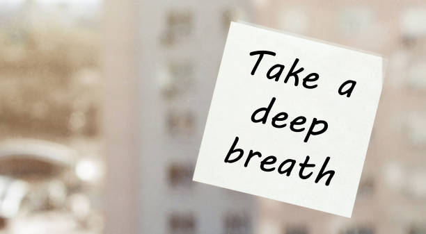 istock white paper with text Take a deep breath on the window 1254633343