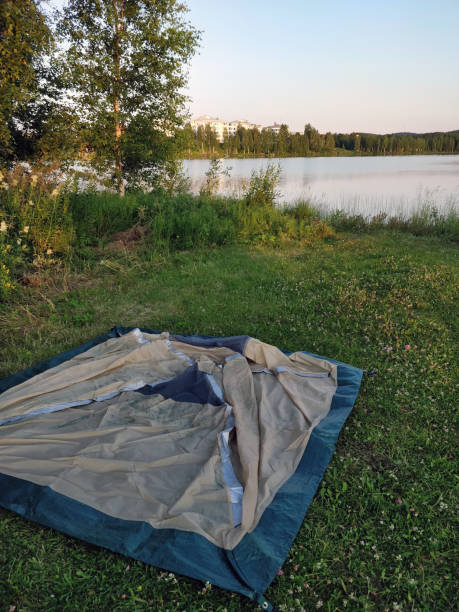 istock Ready to set up a tent after hiking 1254634386