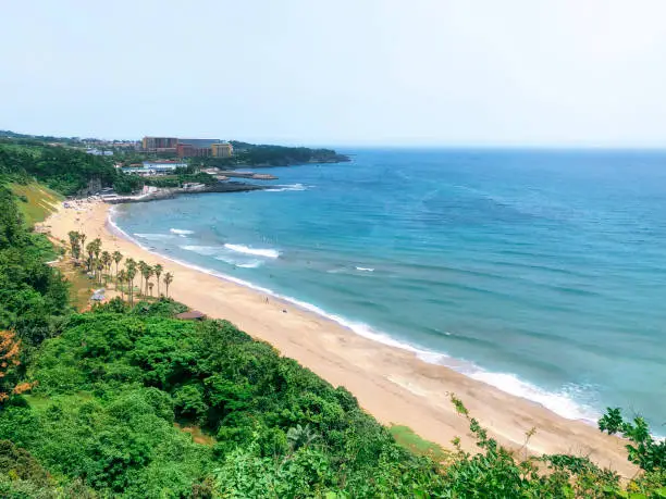 Summer day on the beach of Jeju Island, South Korea. View from air.