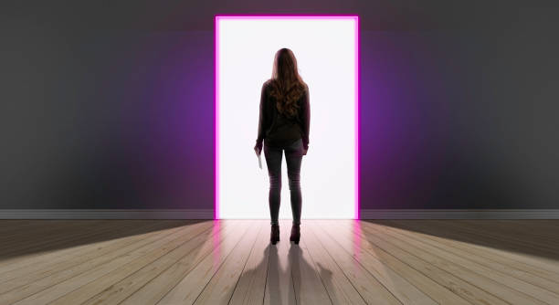 istock Woman standing in open digital portal 1254638475