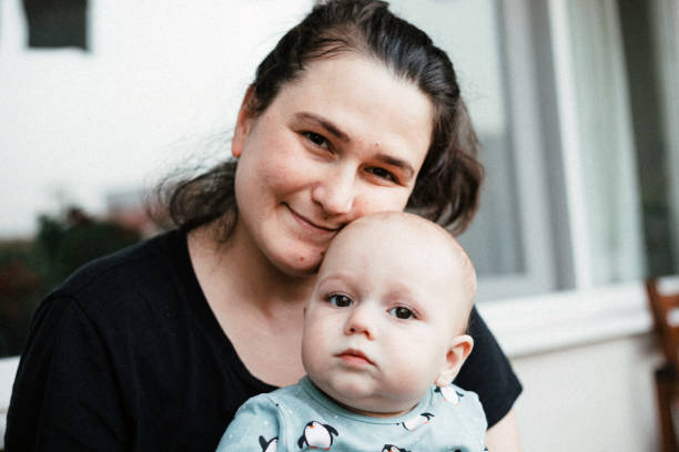 istock Happy mother with her baby boy 1254639242