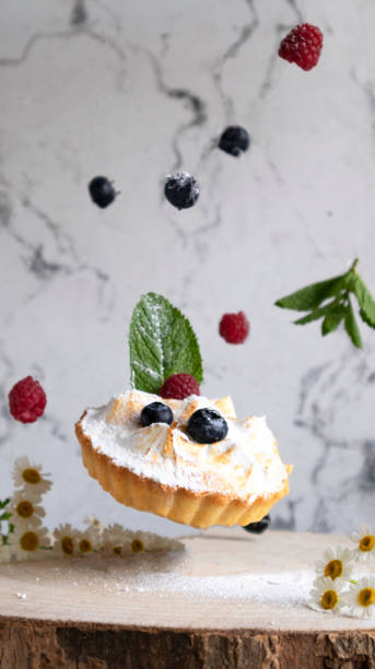 flying cake with protein cream and berries
