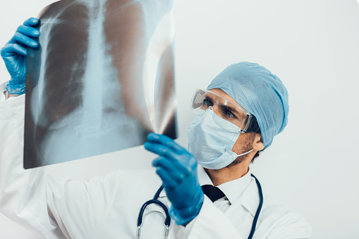 close up. doctor examining an x-ray of the lungs. photo with a copy-space.