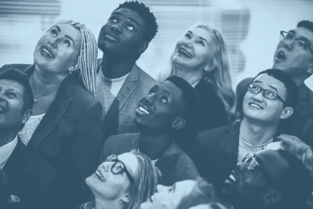 istock multinational group of young business people looking up 1254647707