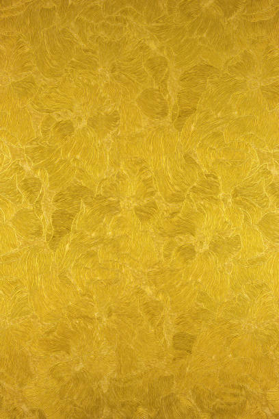 istock luxury embossed gold background of flowers. horizontal 1254648360
