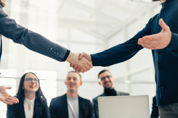 istock close up. business handshake in the office 1254650859