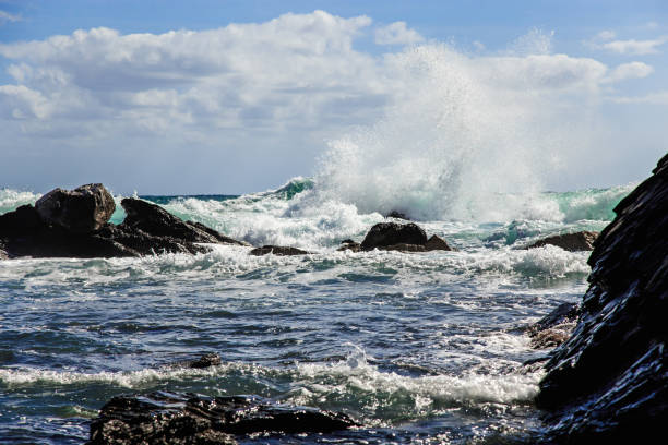 istock Waves crashing on the rocky coast 1254661248