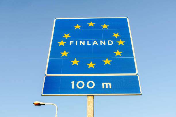 istock Finland Border Road sign 1254663414
