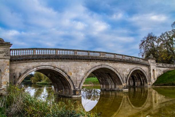 istock Bridge In Autumnal Rural England. 1254671754