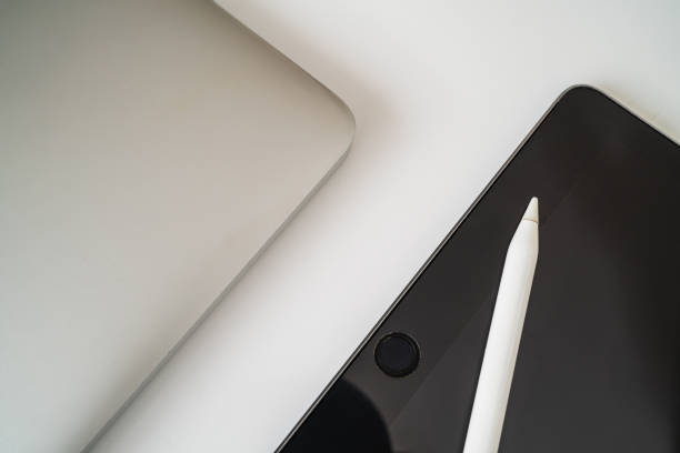 istock Flat lay composition with laptop and tablet on white background. Home office 1254672808