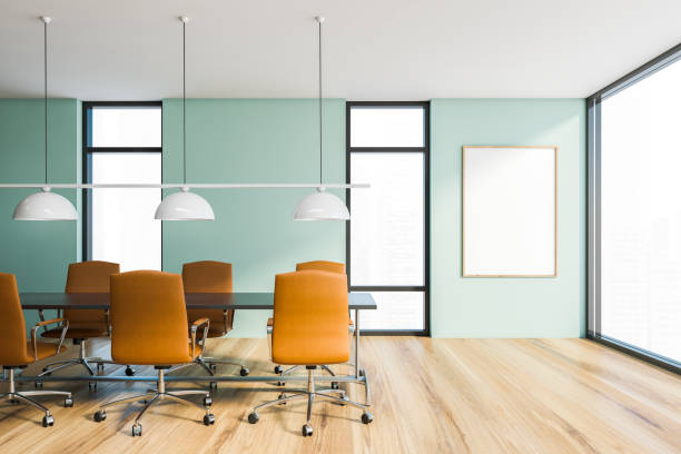 istock Blue and orange meeting room with poster 1254673650