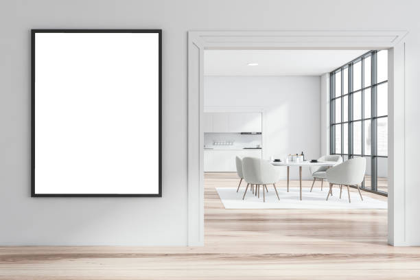 istock White dining room and kitchen with poster 1254673660