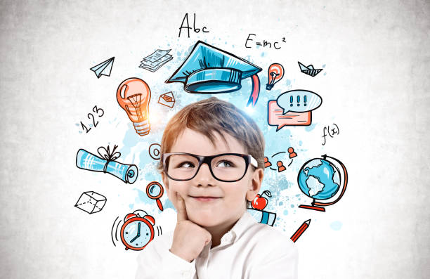 istock Smiling little boy in glasses, education sketch 1254673809