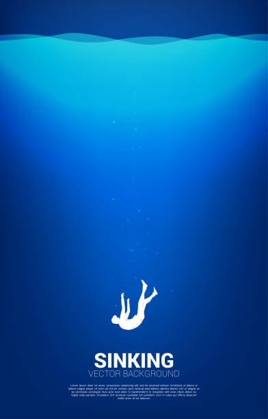 istock silhouette of businessman sinking down in water. 1254674719