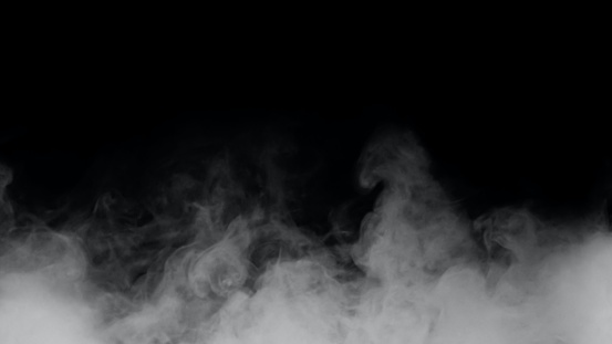 Humo de niebla o blanco sobre un fondo negro photo