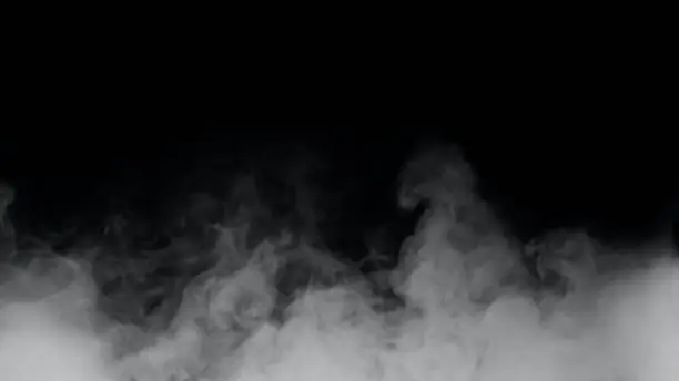 Photo of Fog or white smoke on a black background