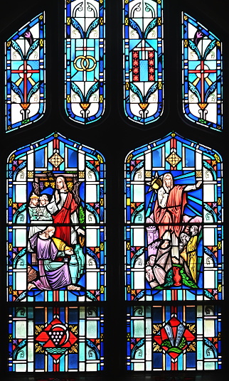 Stained glass windows in church.
