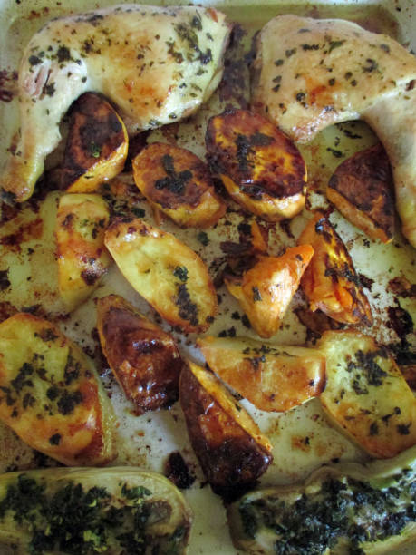 istock Baked chicken and vegetables 1254680922