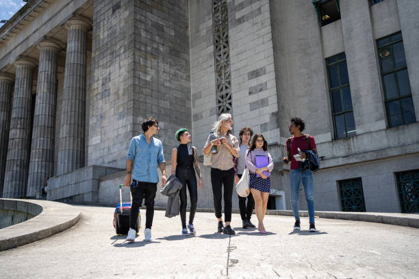 istock Traveling student and a professor enjoying a sunny day together 1254683000