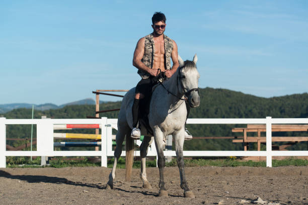 istock Handsome Man on the Horse 1254683823