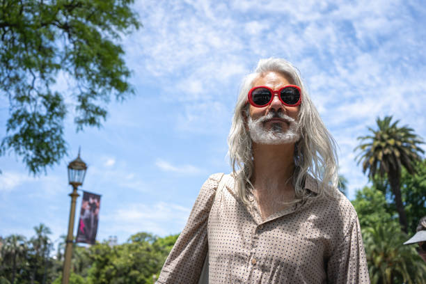 istock Handsome long haired man on a sunny day outdoors 1254684501