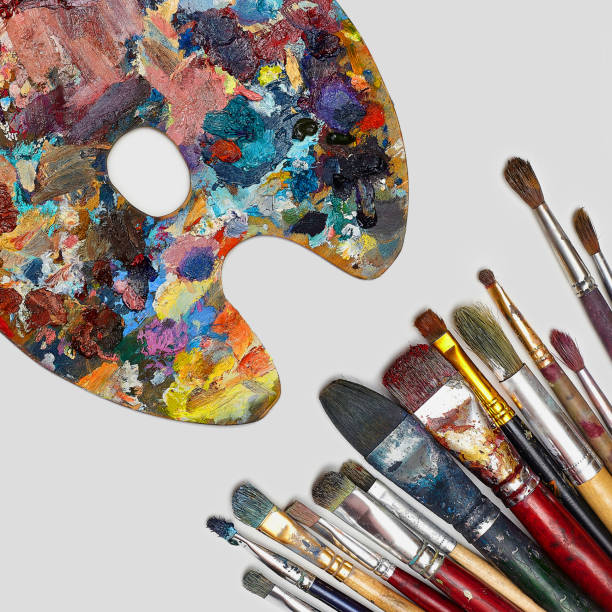 istock Closeup of brush and palette. 1254684538