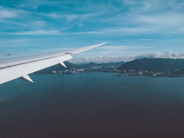 istock Sunrise above clouds from window of an aircraft 1254684574