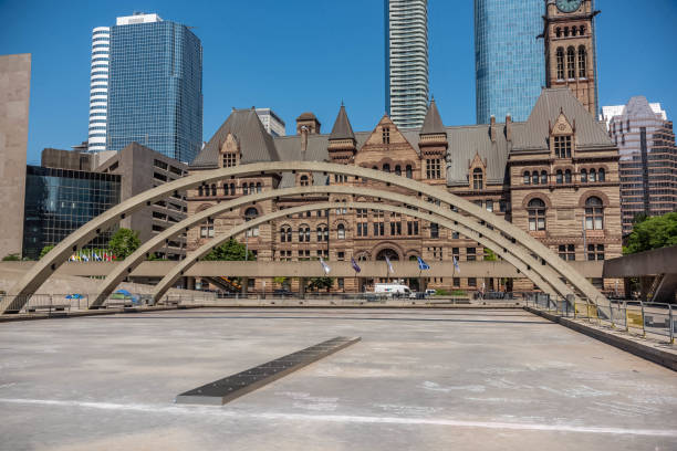 Usually theirs water in the middle, but people have been protesting at Toronto city hall to defund the police. so the city decided to cover up the water.