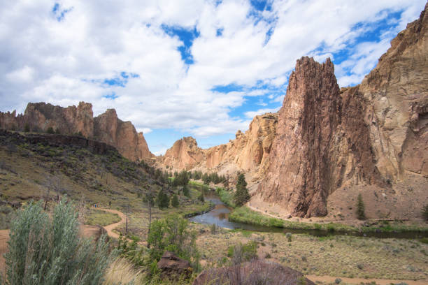 istock Smith Rock central Oregon sunny blue skies clouds 1254686092