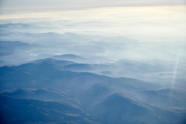 Amazing foggy mountains during sunrise in Madrid, Community of Madrid, Spain