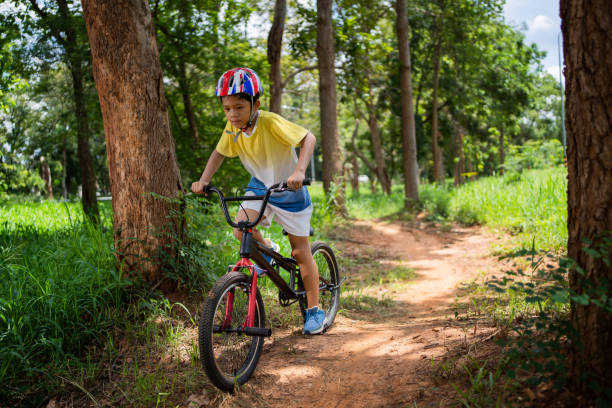 istock Asian boy is training for a happy mountain biking. 1254692954