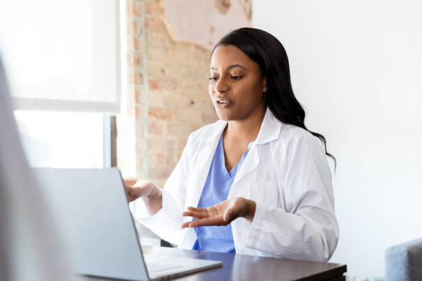istock Doctor talking with patient during virtual medical appointment 1254704734
