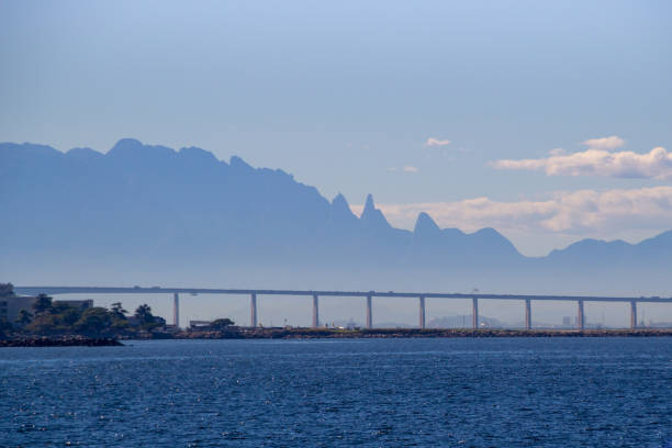 rio x niteroi bridge, with the bottom of the mountain ( Serra dos Orgaos ) range the main link between the cities of Rio de Janeiro and Niteroi in Brazil.