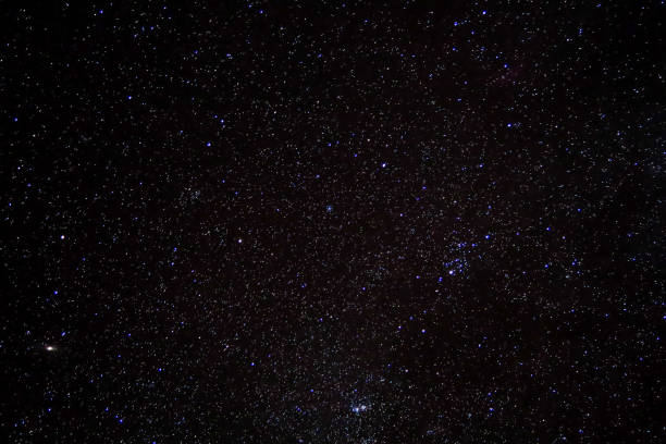 istock stars on black background, photo as background 1254707484