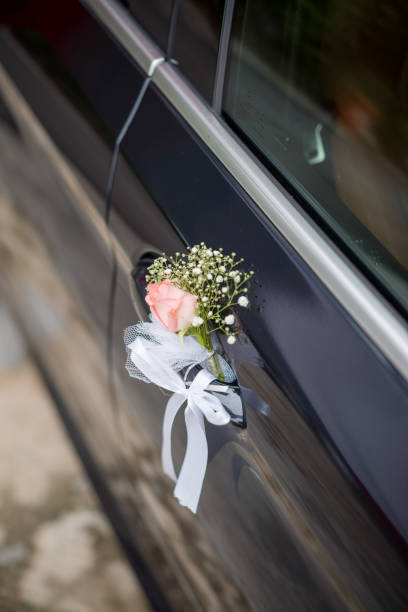 istock Fresh flower decoration on wedding car 1254710194