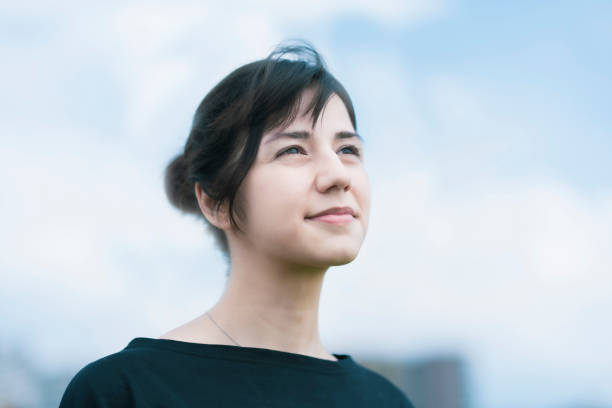 istock A young woman showing a relaxed expression 1254714183