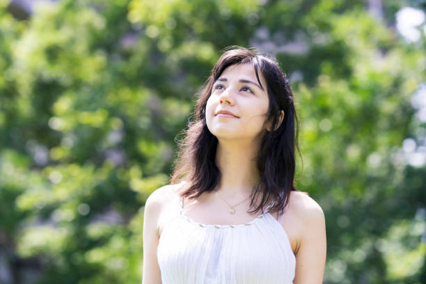 istock A young woman showing a relaxed expression 1254714912