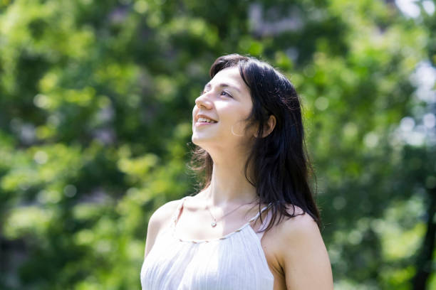 istock A young woman showing a relaxed expression 1254715113