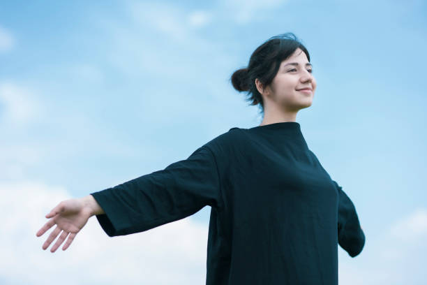 istock A young woman showing a relaxed expression 1254715134